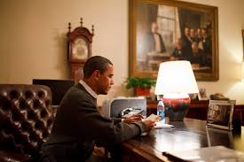President Obama sits in his office in the White on a late night, reading as he was known to do late into the evenings, a clear demonstration of his notorious 5 hours a night of sleep.